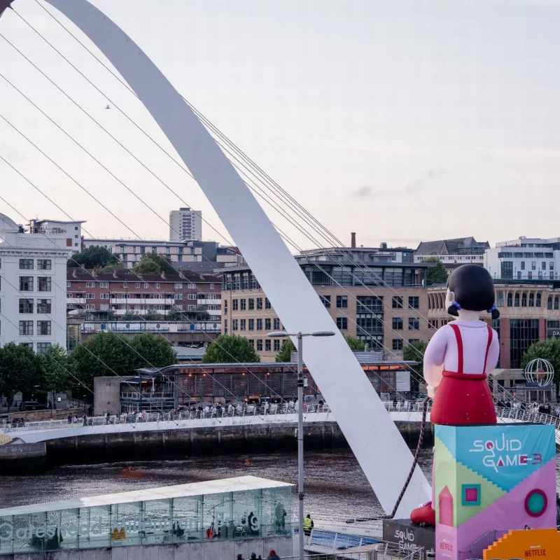 Squid Game Inflatables Staring at Each Other In Newcastle